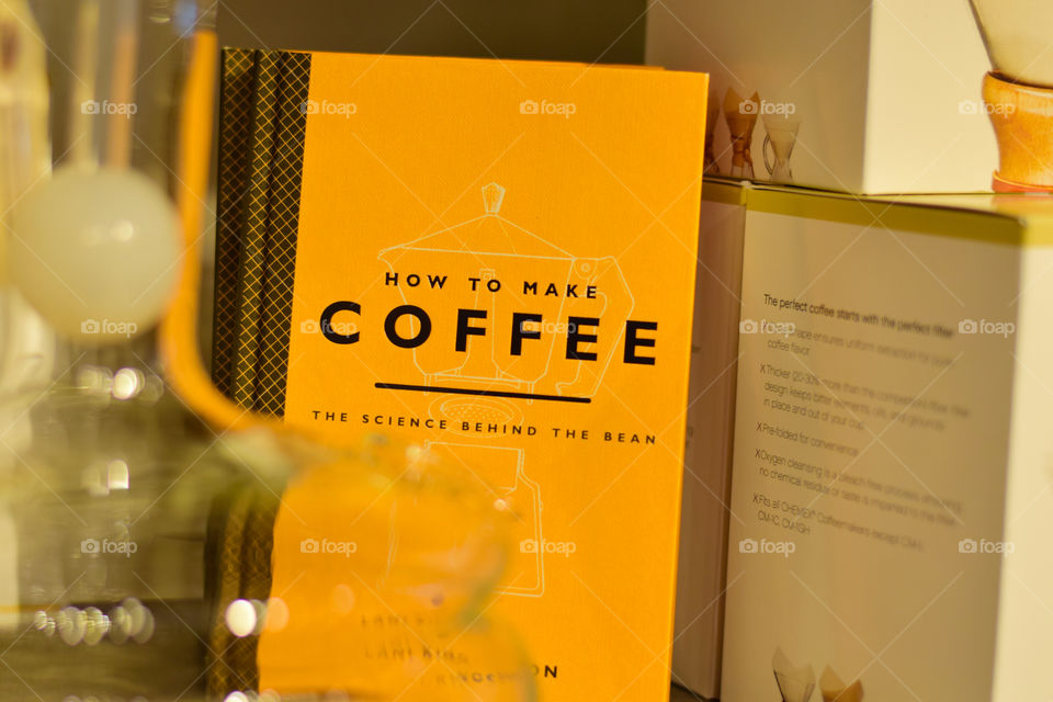 Pop of Orange. Cover of a book how to make coffee
