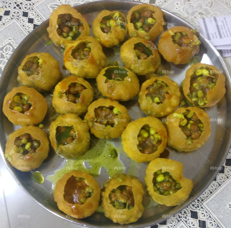 Indian snacks - PANIPURI or GOLGAPPE, round shape hollow crispy, filled with sweet and sour sauce, superb taste, little spicy!