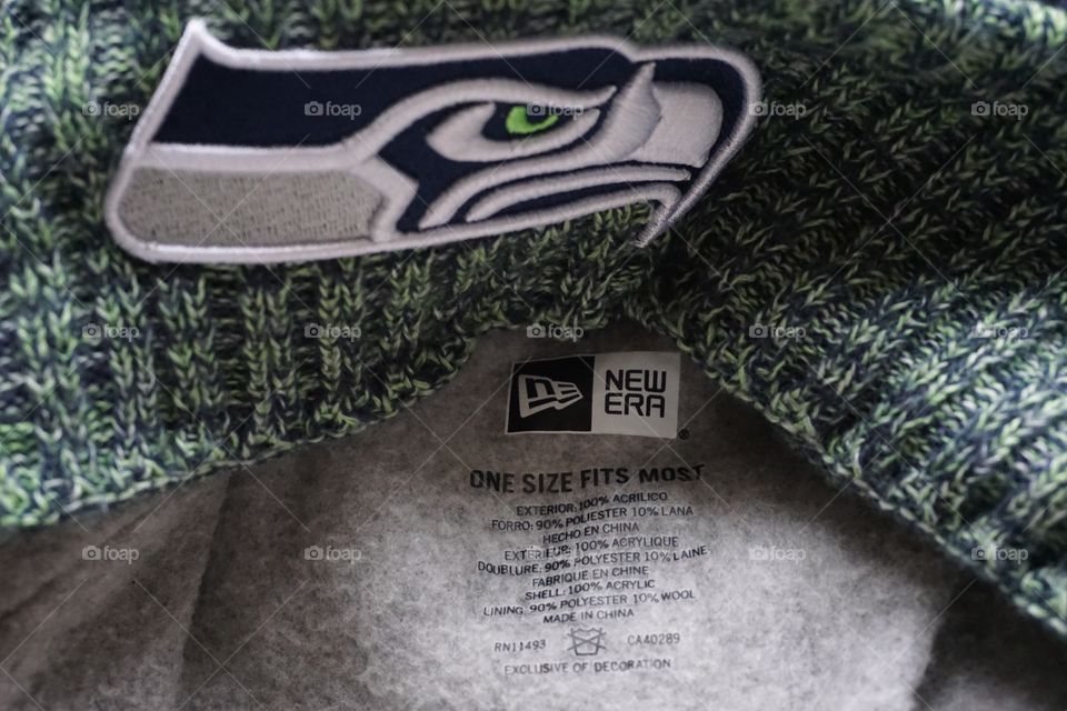 American Football Hat Seattle Seahawks ... ONE SIZE FITS MOST the wording makes me laugh ..   😂