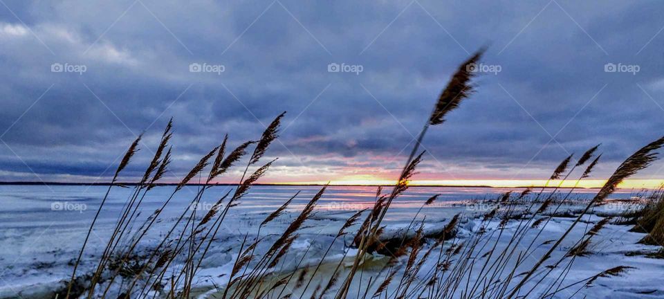 Beautiful sunset by the Baltic Sea, Finland, in March