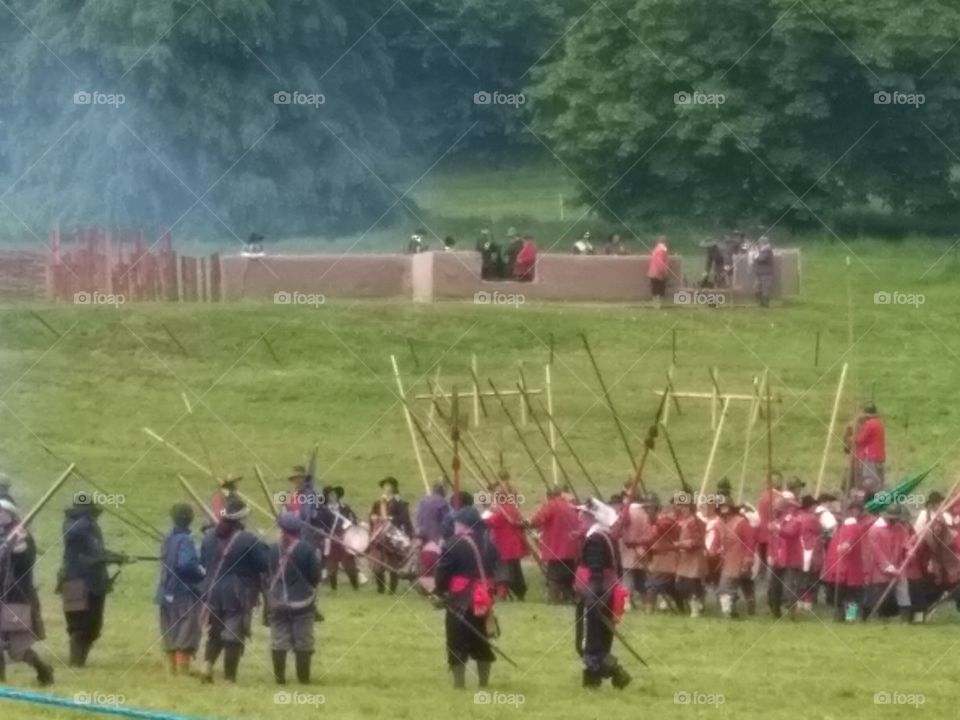 sealed knot battle
people in civil war costumes fighting