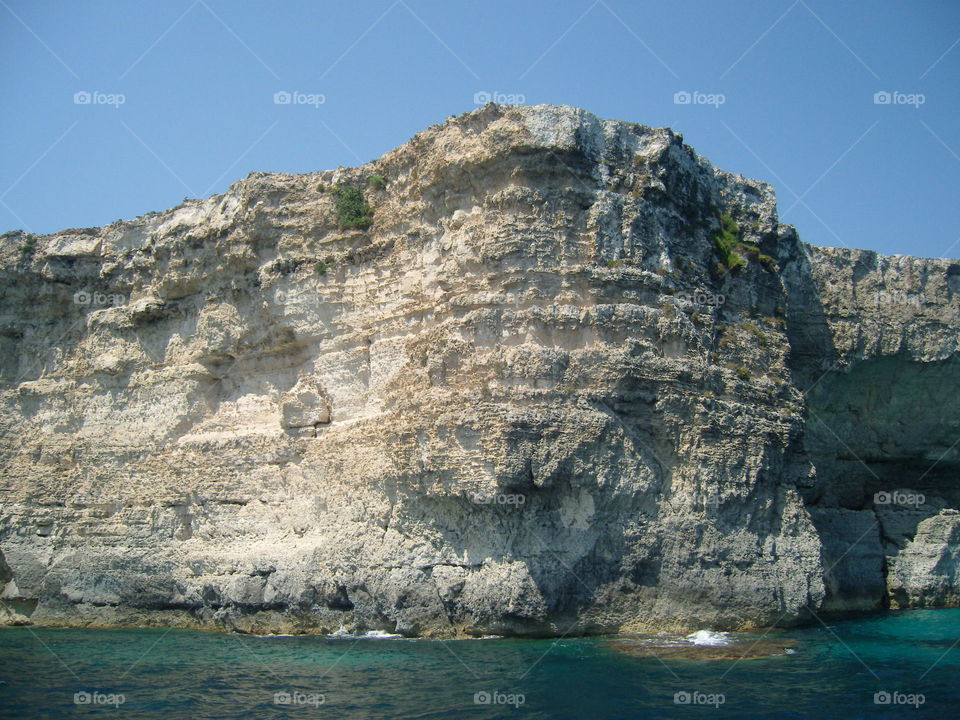 Malta steep limestone slopes seashore