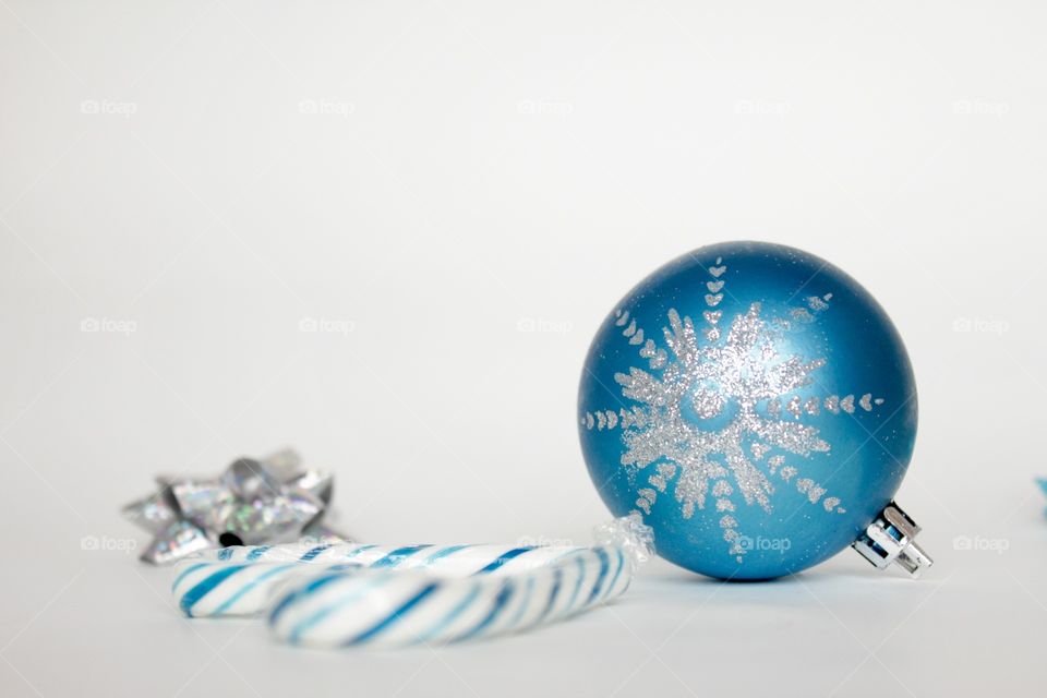 Blue candy cane and Christmas ball 