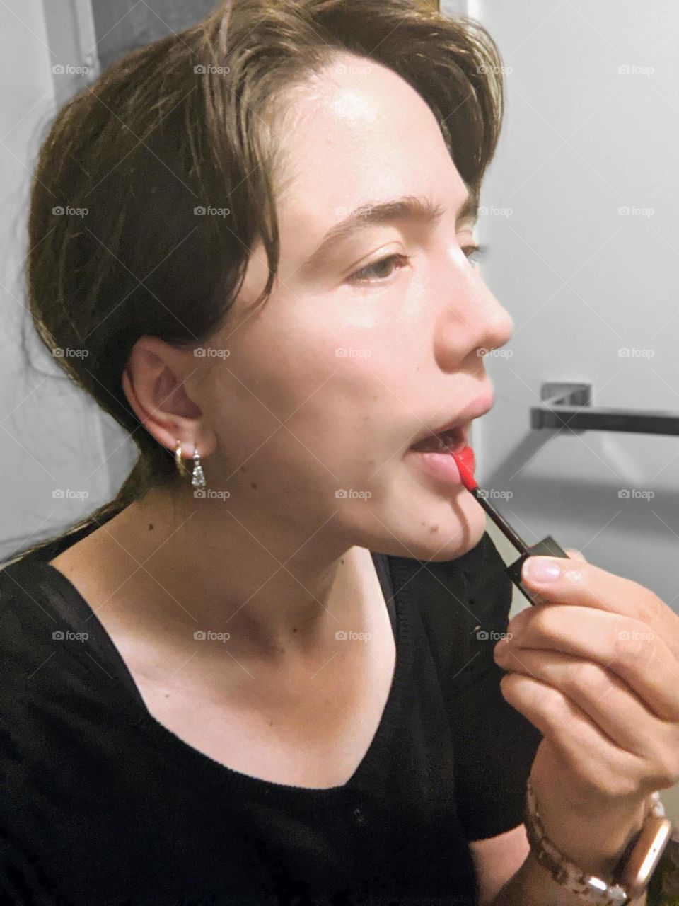 Putting on some red lipstick 💄