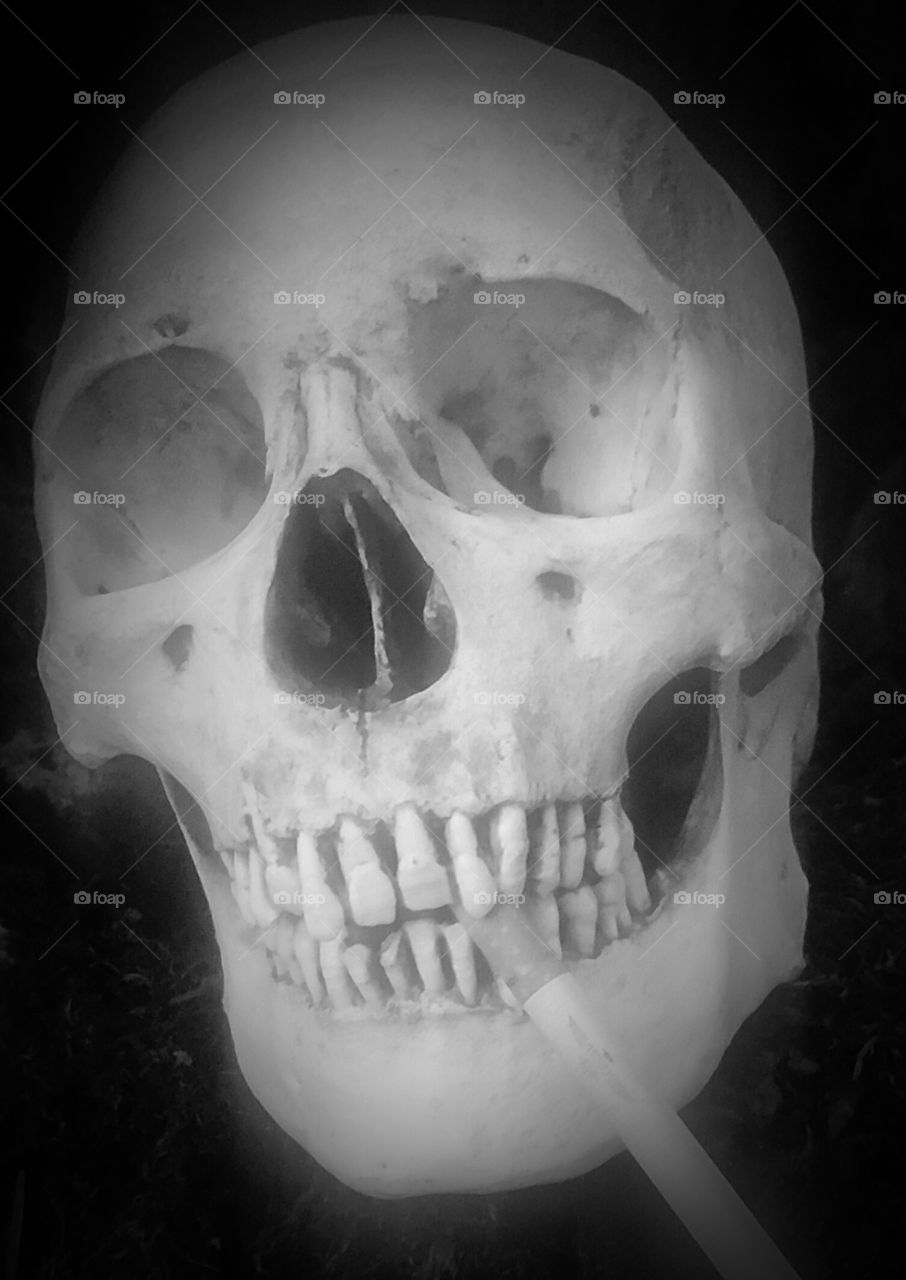 Smoking human skull.