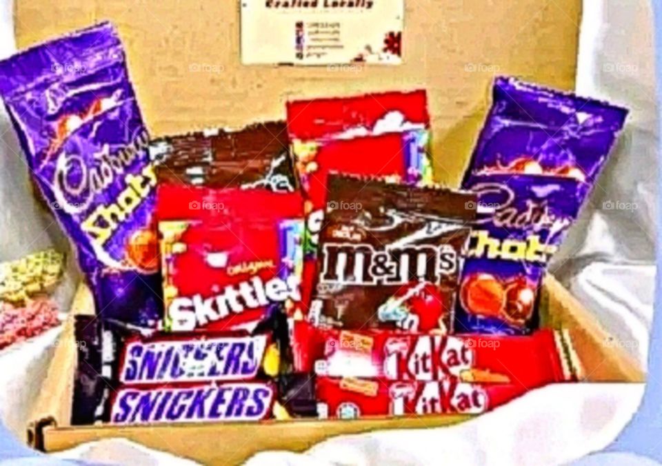 Chocolates are being enjoyed at a birthday party.