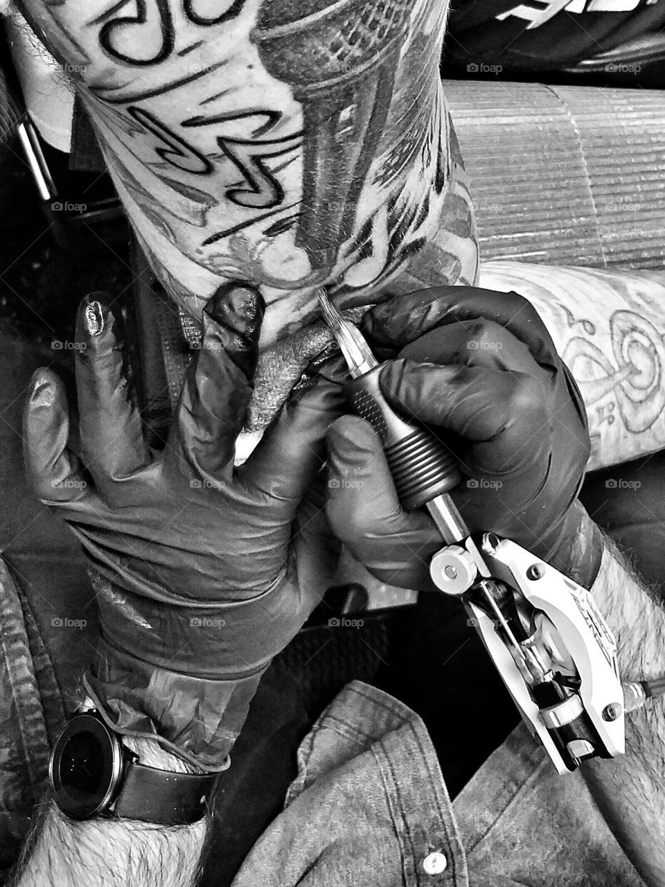 My best friend getting his tattoo sleeve finished.