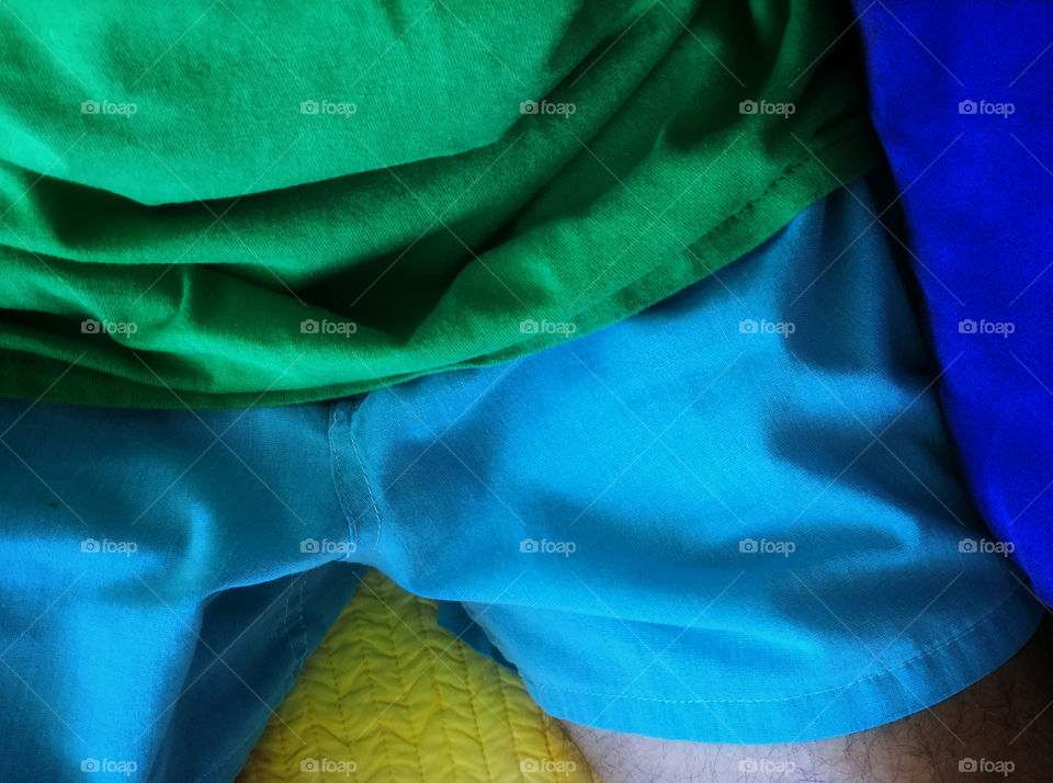 A closeup of colorful boxer shorts and t-shirt