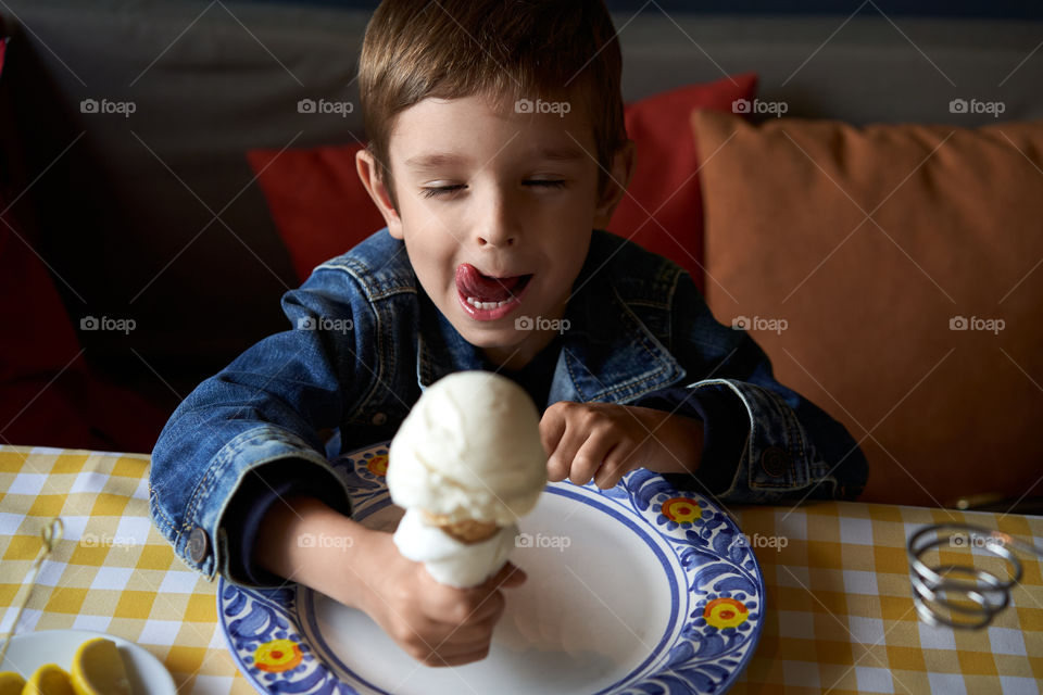 A boy eating ice cream 