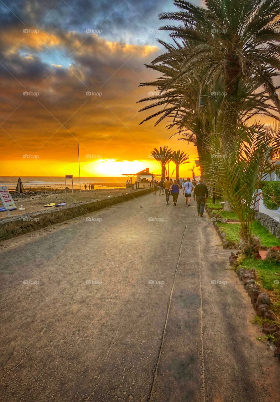 Nothing beats a sunset walk after a long day of sight seeing.   The bright brilliant color is burned into my memory.