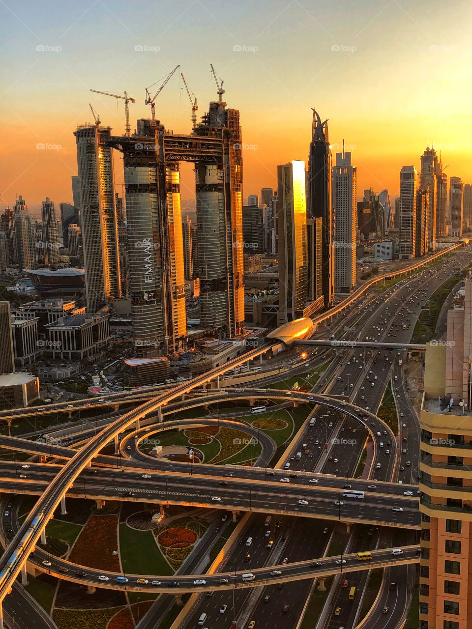A view of downtown Dubai! The modern architecture illuminated by the evening sunset gives the city a magical glow! 