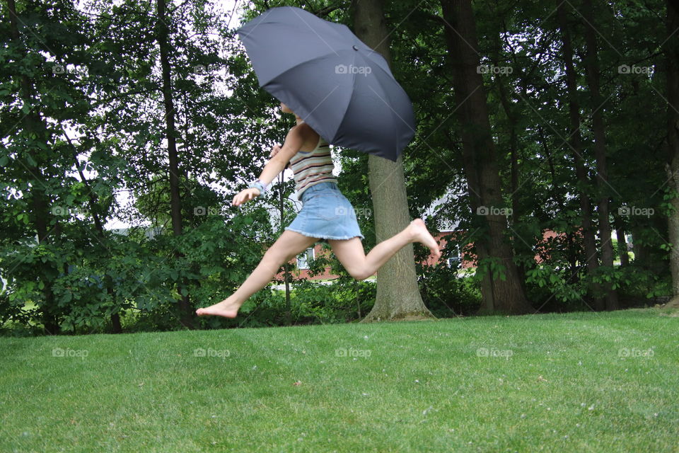 Girl with Totes umbrella