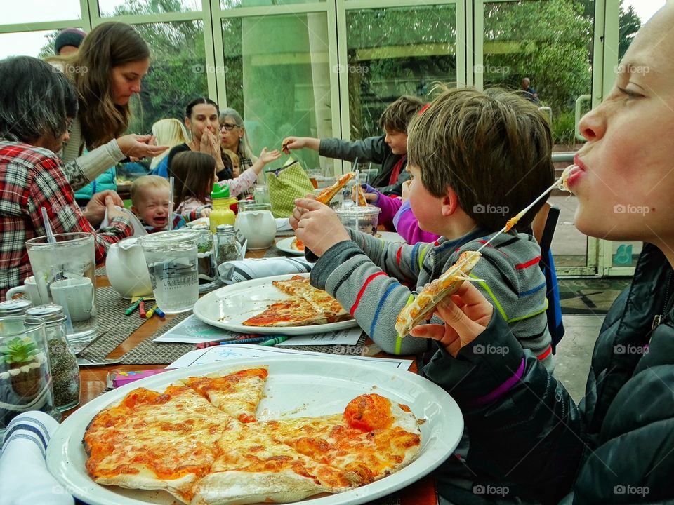 Family Eating Pizza
