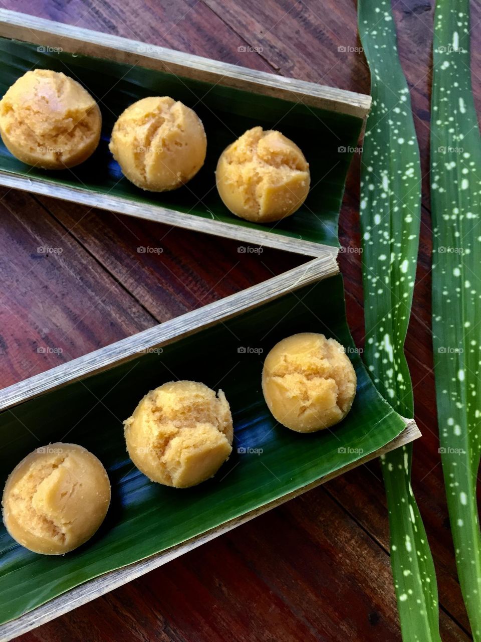 Steamed rice cake put in a bamboo as its plate