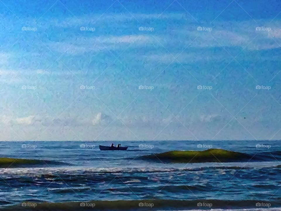 Row boat on the ocean
