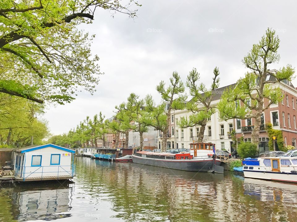 Boats in Amsterdam canal 