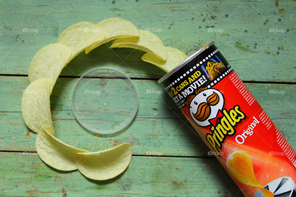 Pringles chips on a wooden table