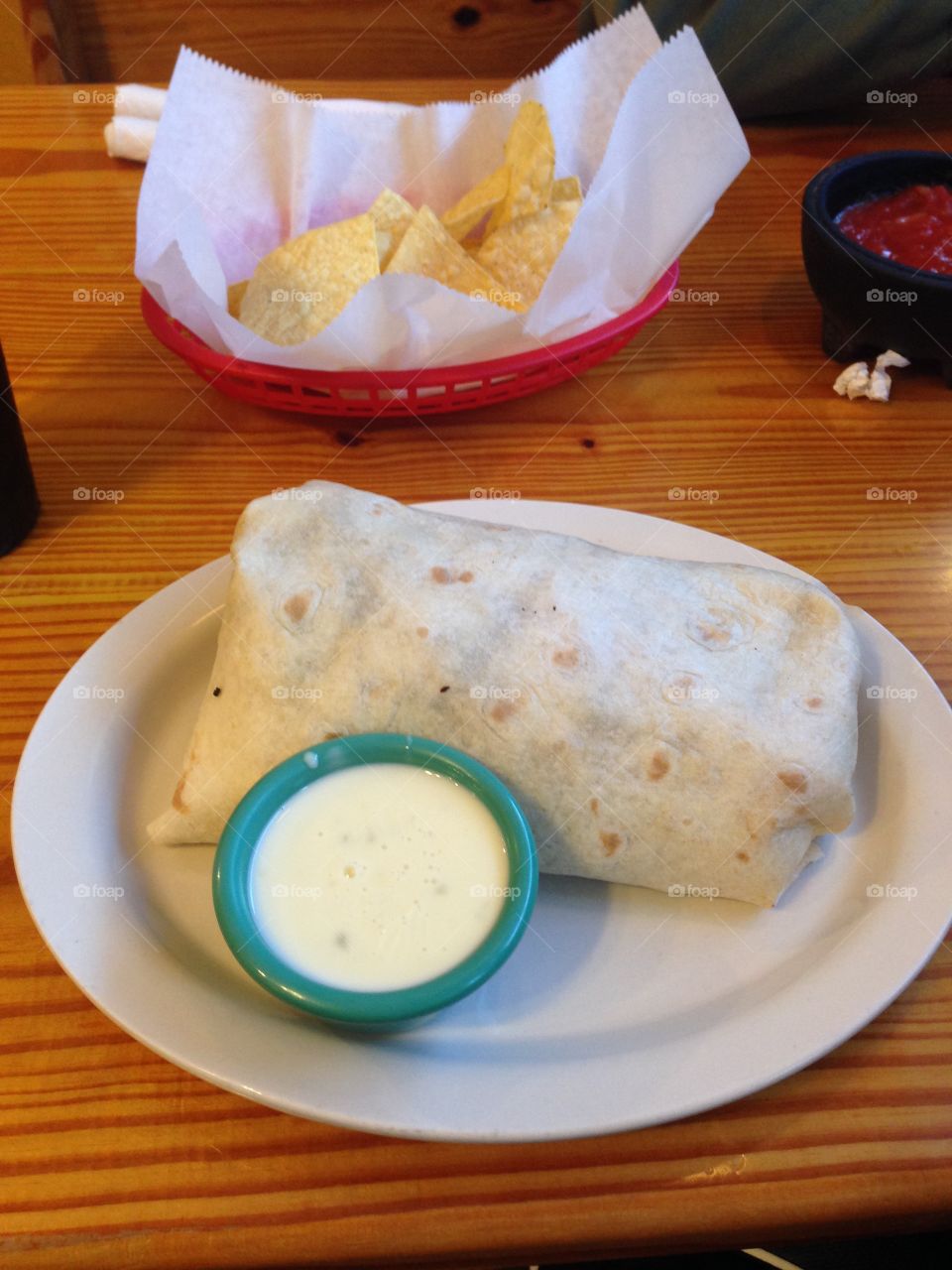 Burrito with Queso on a Plate