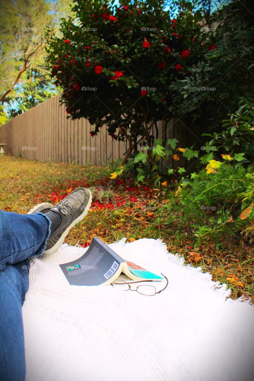 Outside with a book and sunshine 