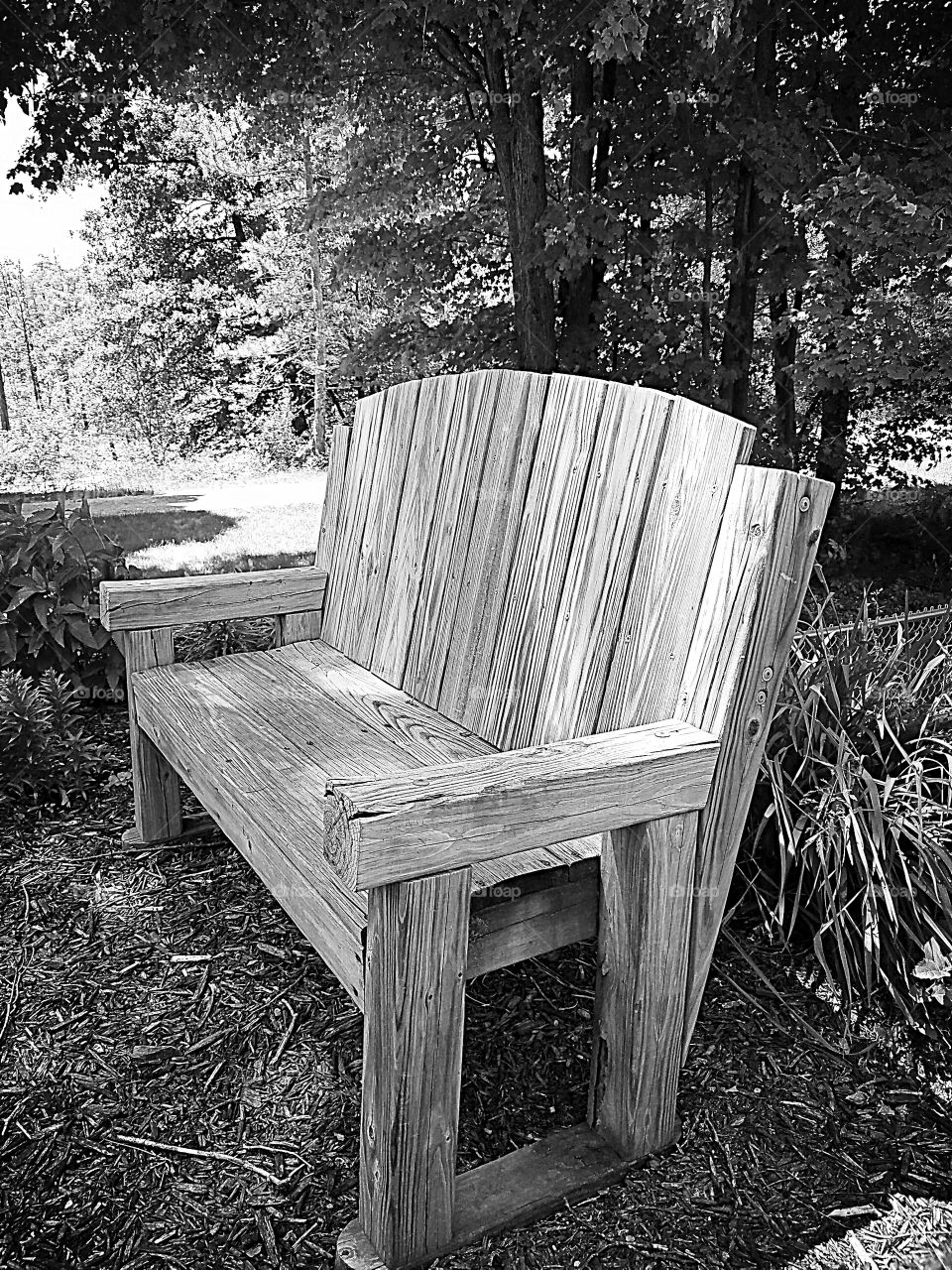 wooden garden bench in black and white