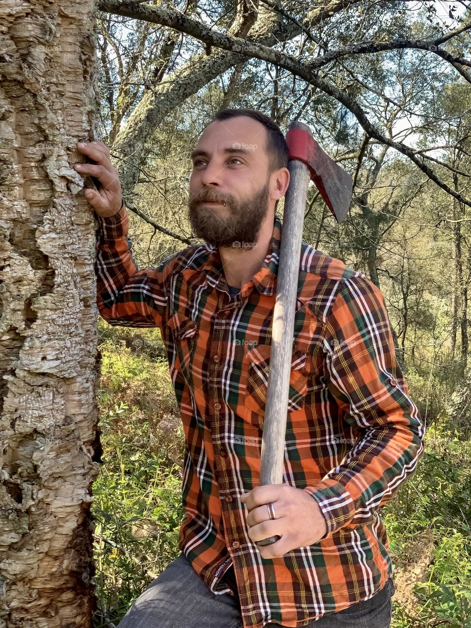 Portrait of Kevin during a break from chopping wood