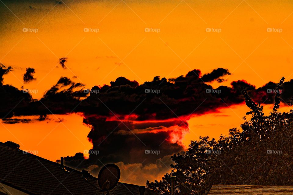 explosion looking cloud over some houses