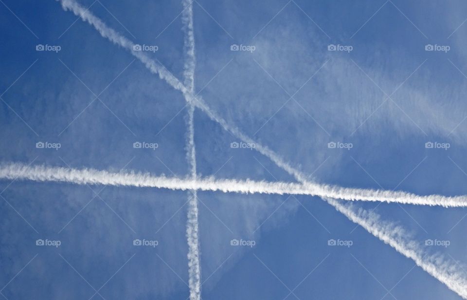 Low angle view of vapor trail against sky