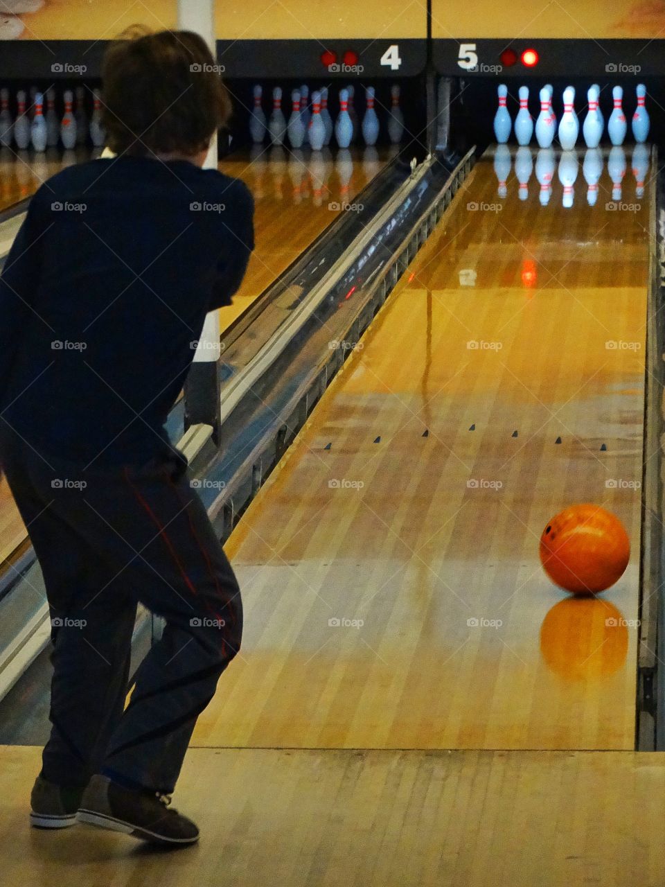 Boy In Bowling Alley
