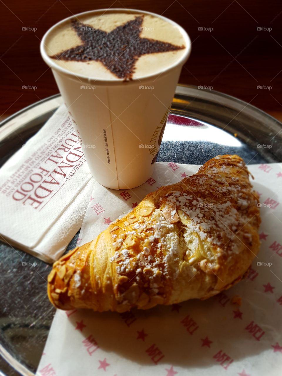 Cappuccino and almond croissant