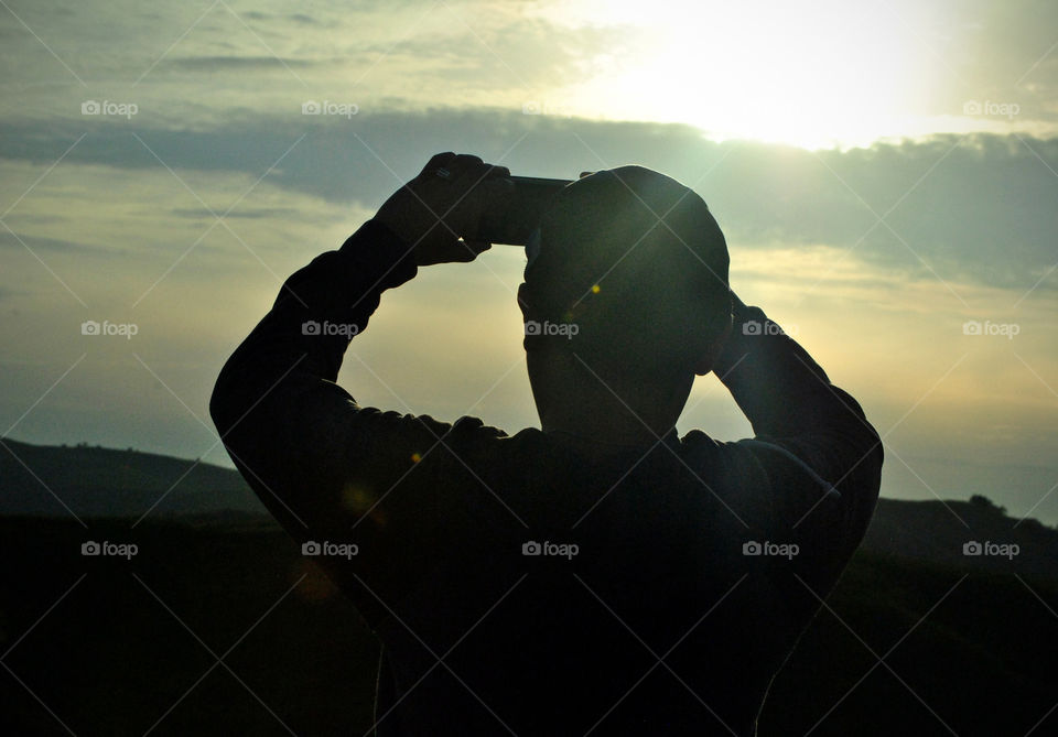 man taking a photo using Mobile