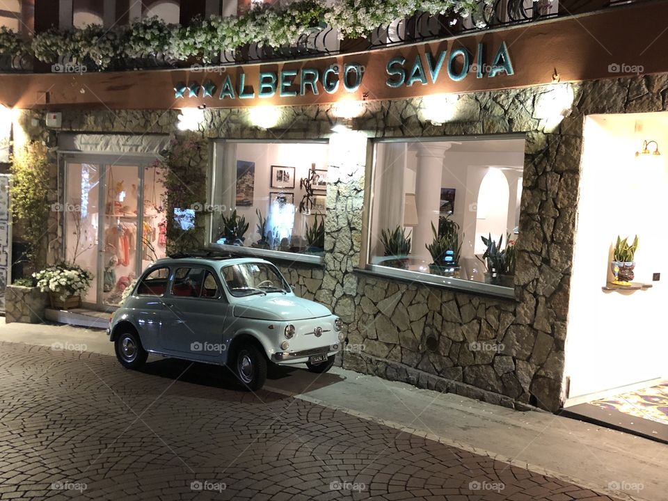 An old blue Fiat parked in front of my hotel in Positano, Italy.