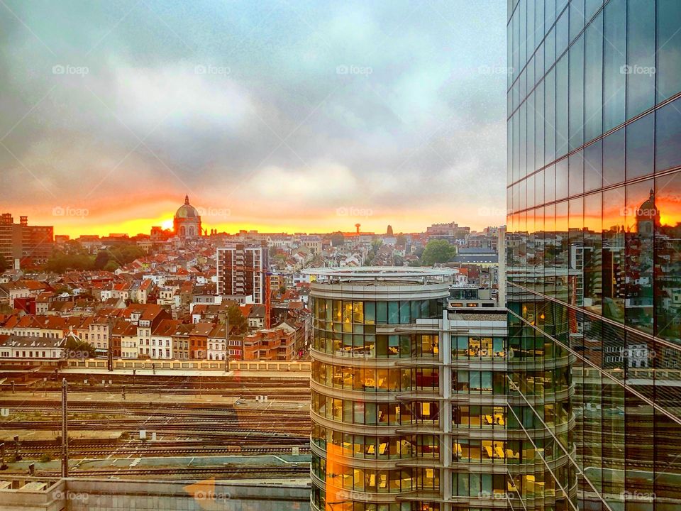 Fiery sunrise cityscape 