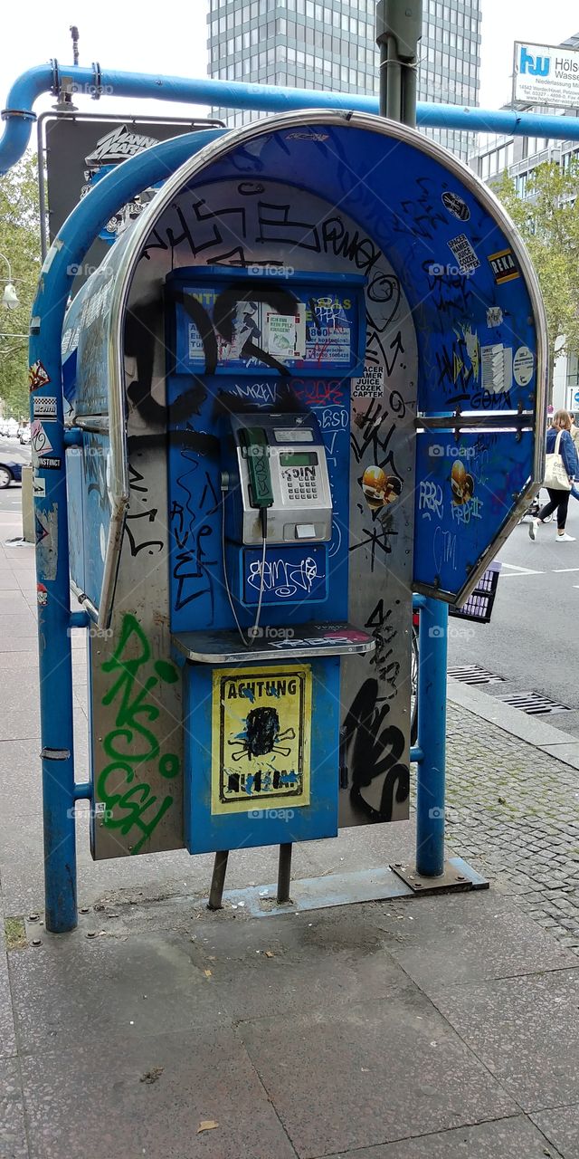 Phone booth with graffiti in Berlin 2017