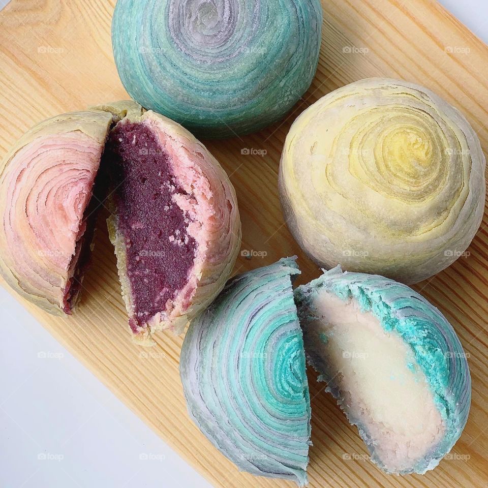 Thousand later mooncakes with pretty pastel blue and pink colours 