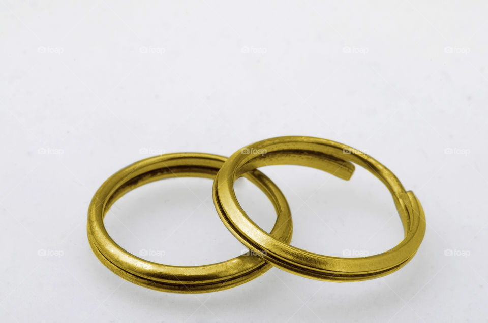 golden rings on white background