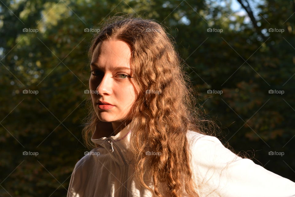 girl beautiful portrait close up in the sunlight