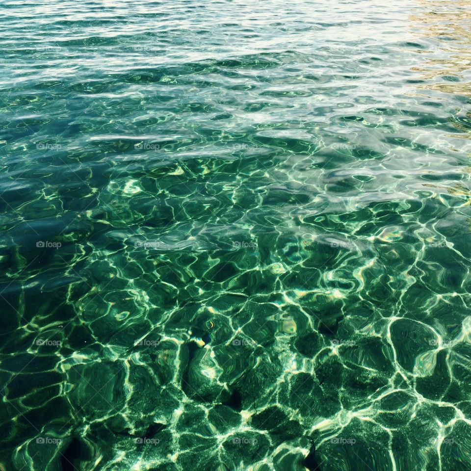 Background of ripple water in swimming pool