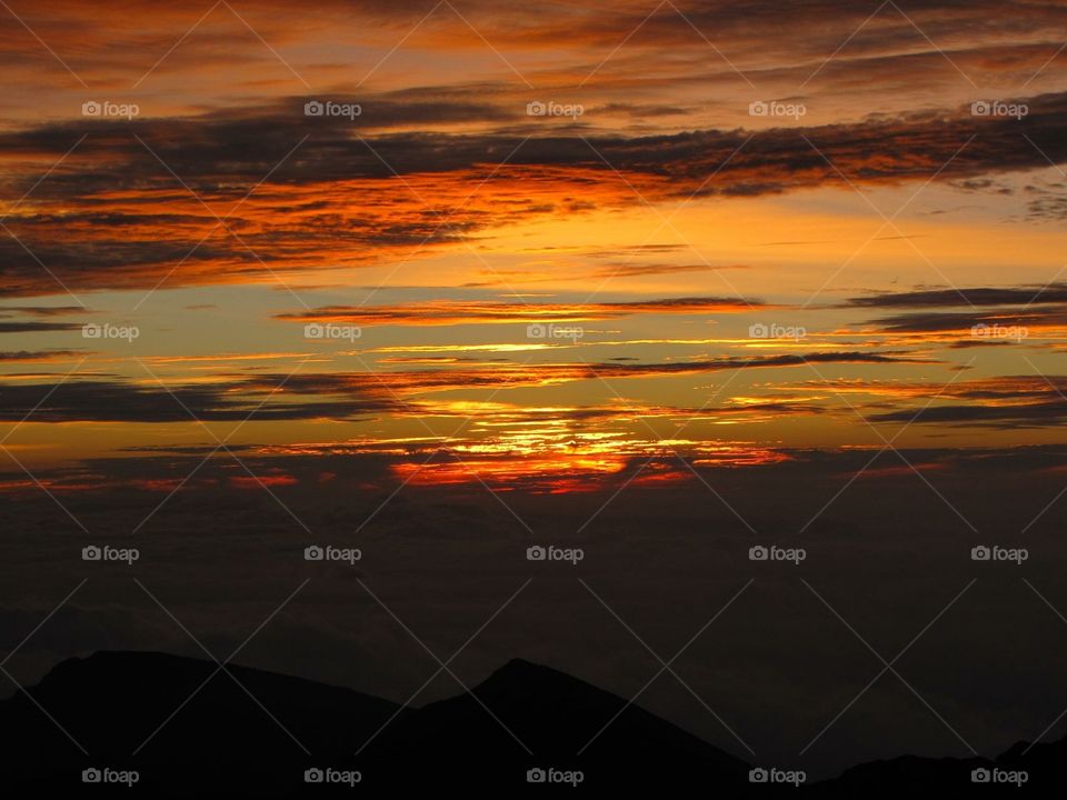 Silhouette of mountains during sunset