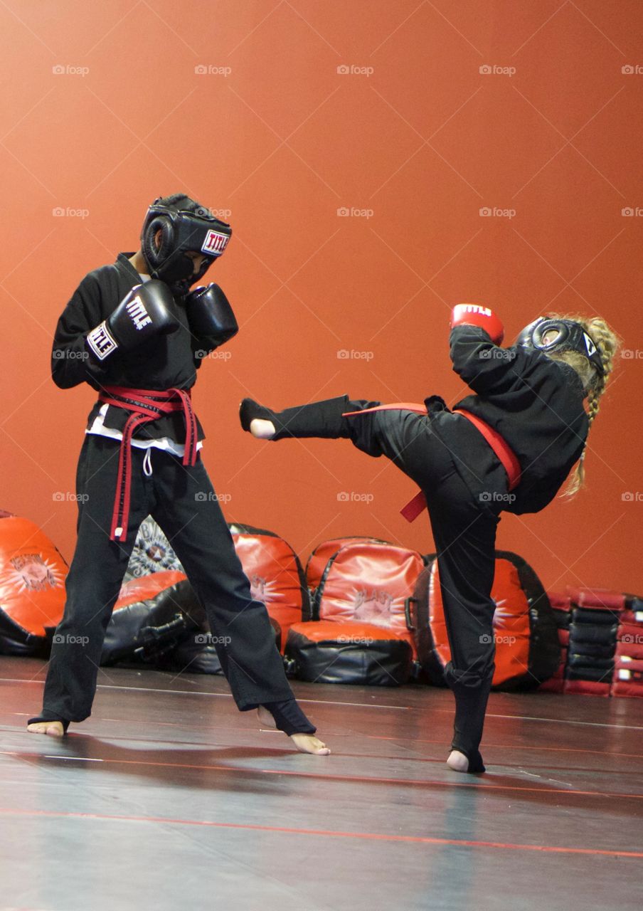 Girl kicking MMA
