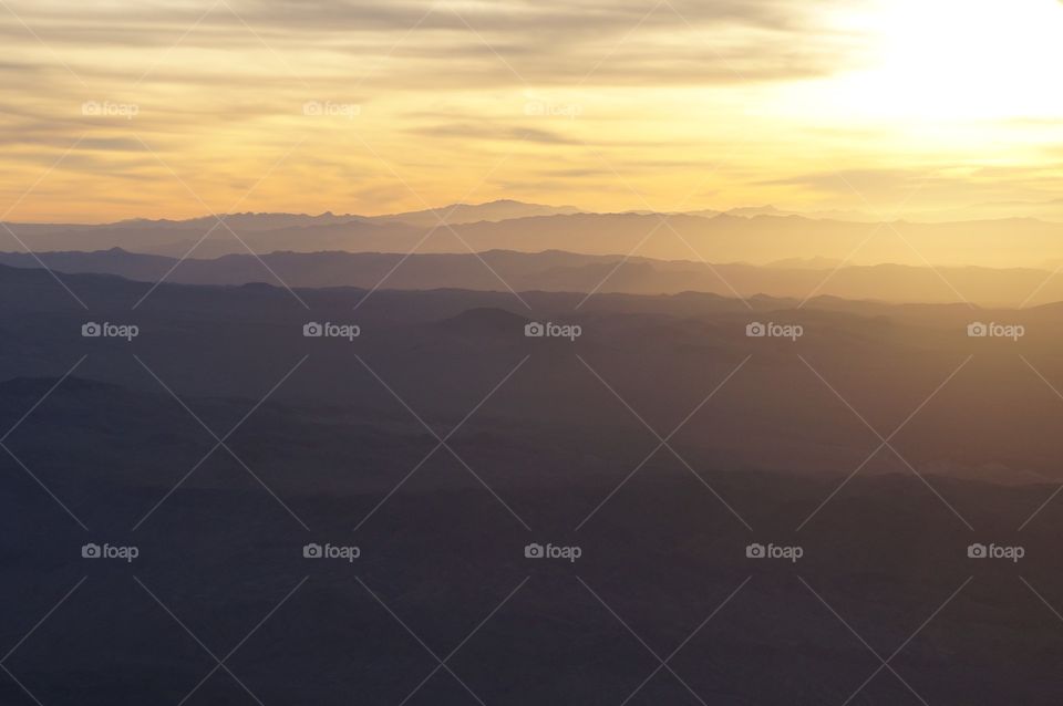 Scenic view of dramatic sky at sunset