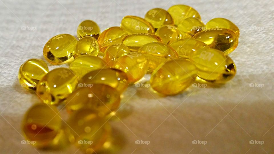 Yellow capsules . Yellow  capsules prescribed for a stubborn cough.
