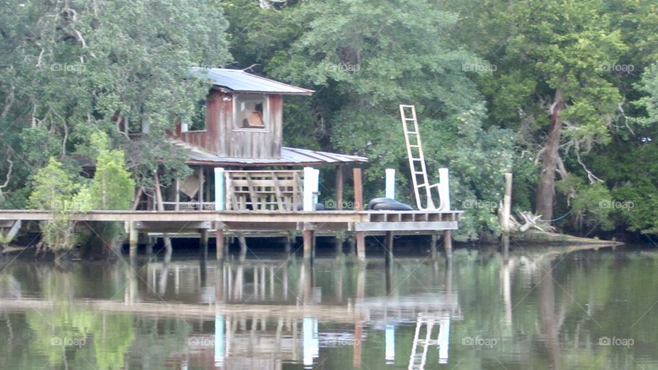 Rustic house on a river