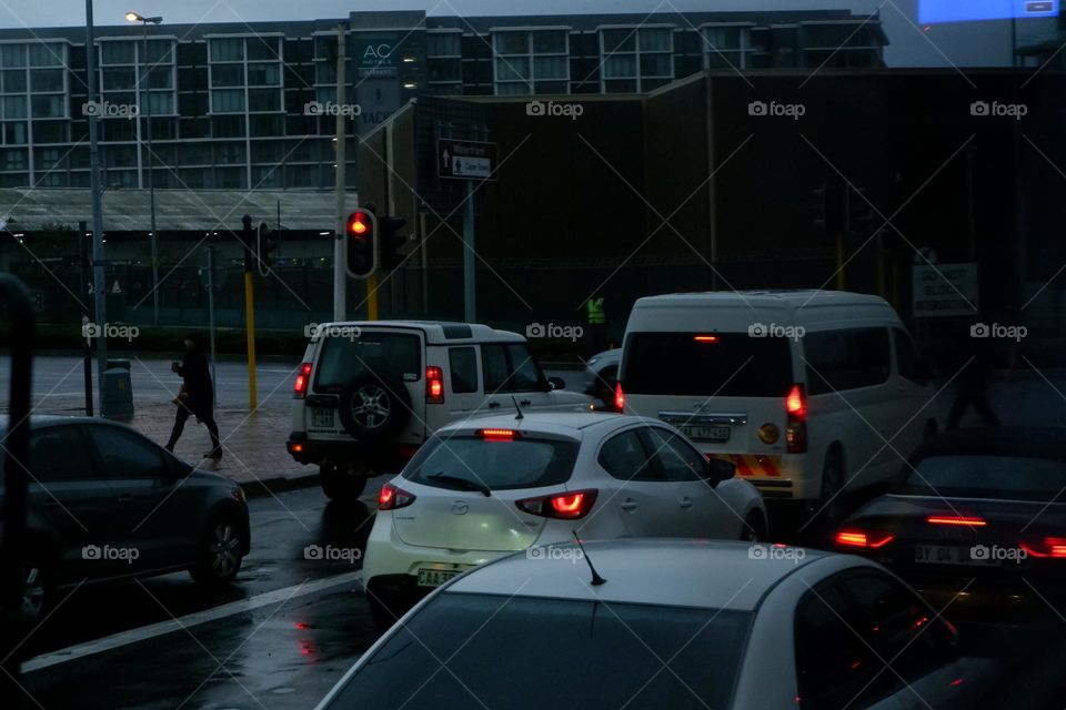 cars stuck in traffic during the rainy season