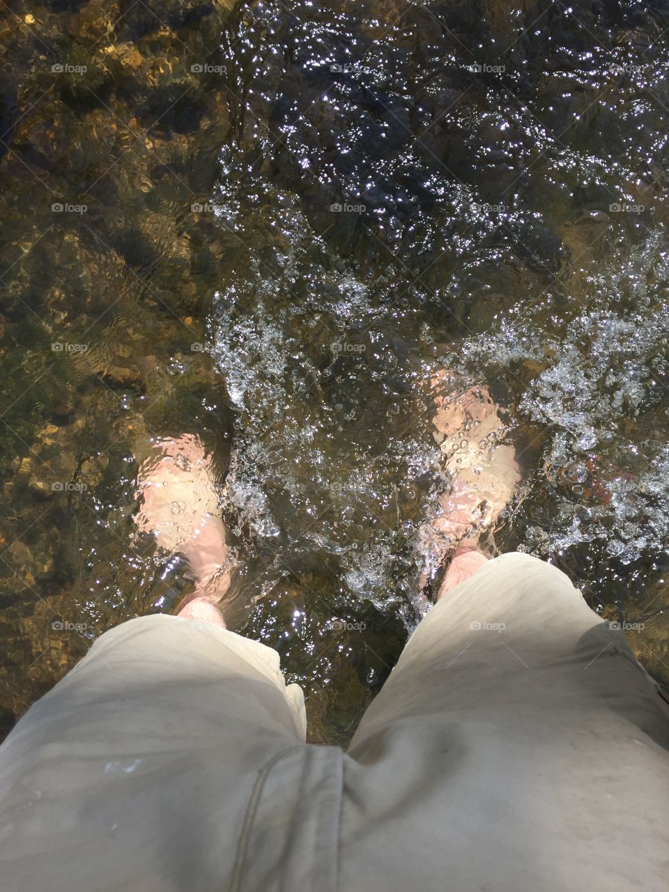 Feet in water