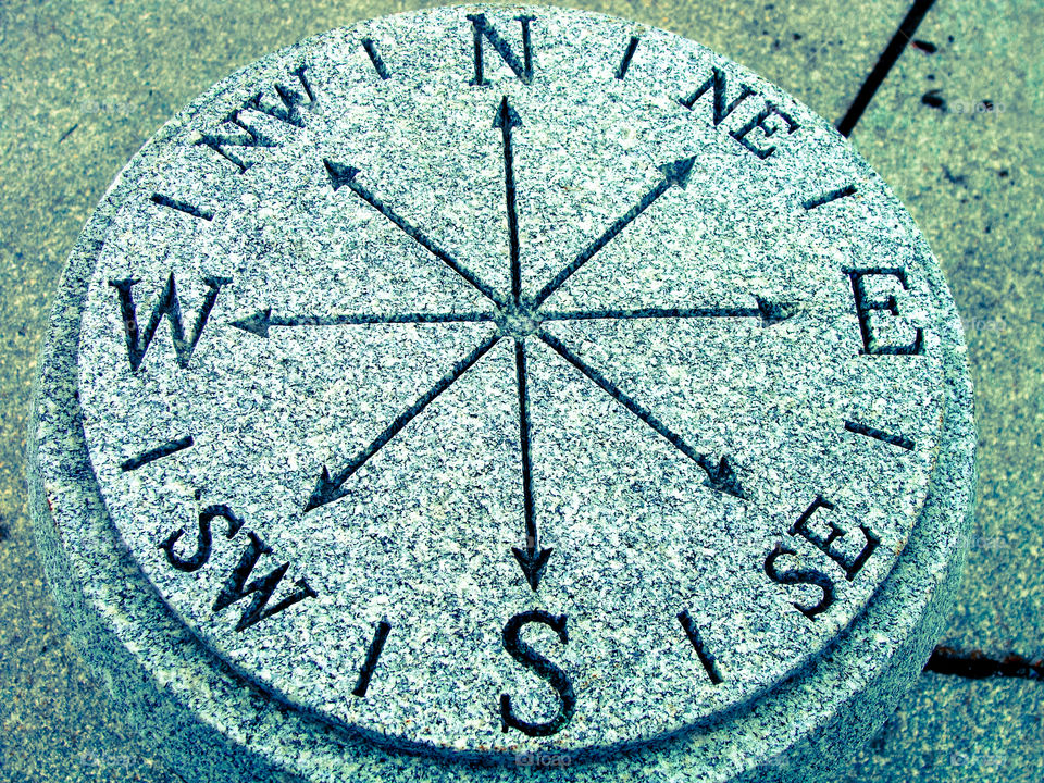 A beautiful granite engraved compass.