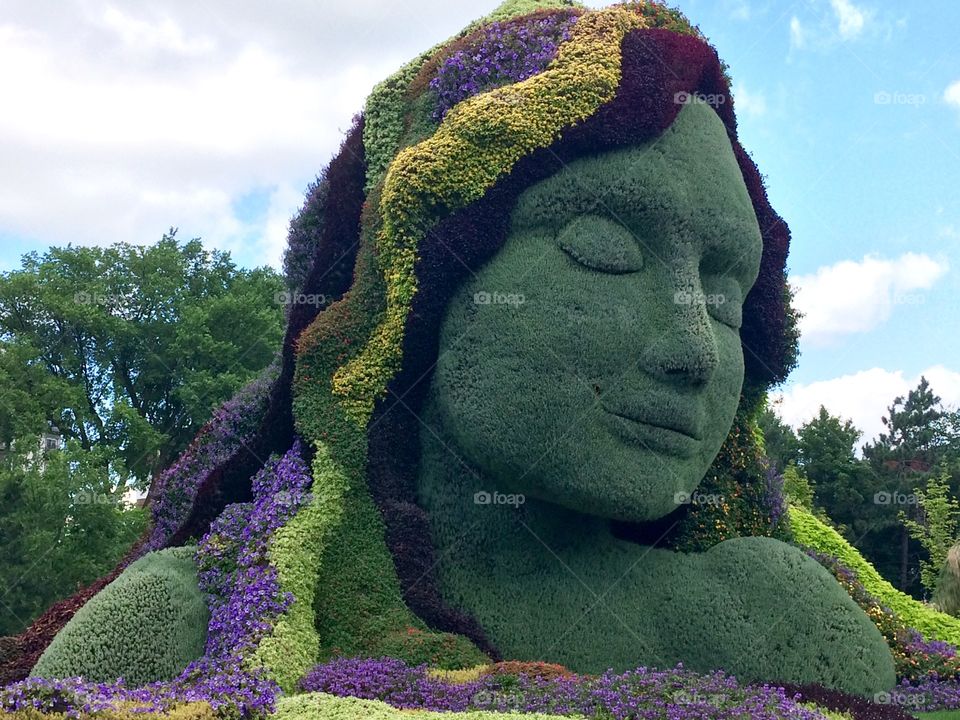 Woman plant and flower sculpture 
Mosaiculture exhibit 