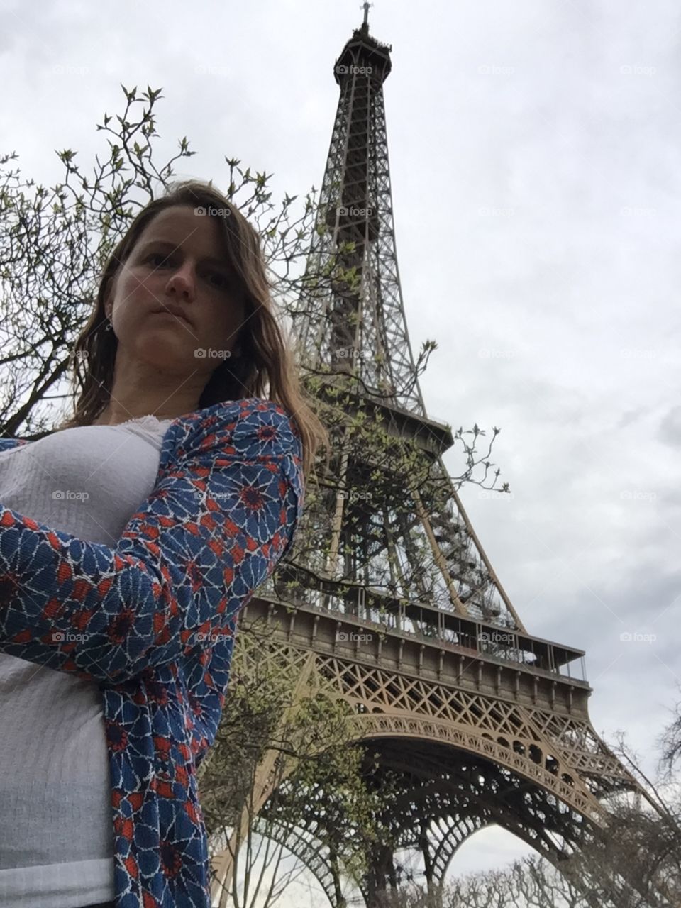 Posing with the Eiffel Tower 