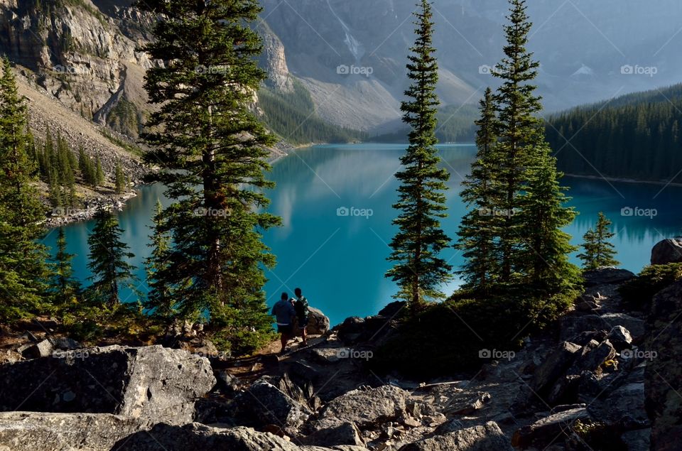 The reward for a long hike is a tantalizingly beautiful blue lake with ice-capped mountains. 
