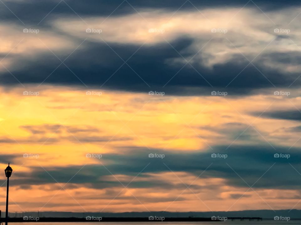 Sunset at sea cloud formations low tide south Australia 