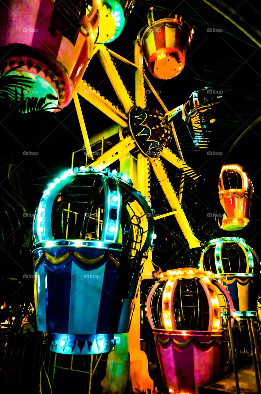 Children Ferris wheel at night
